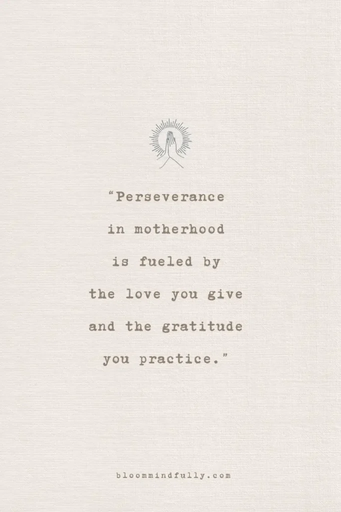 Quote on a beige textured background with a small graphic of hands in prayer and a radiating sunburst above. The text reads, 'Perseverance in motherhood is fueled by the love you give and the gratitude you practice.' The website bloommindfully.com is displayed at the bottom.