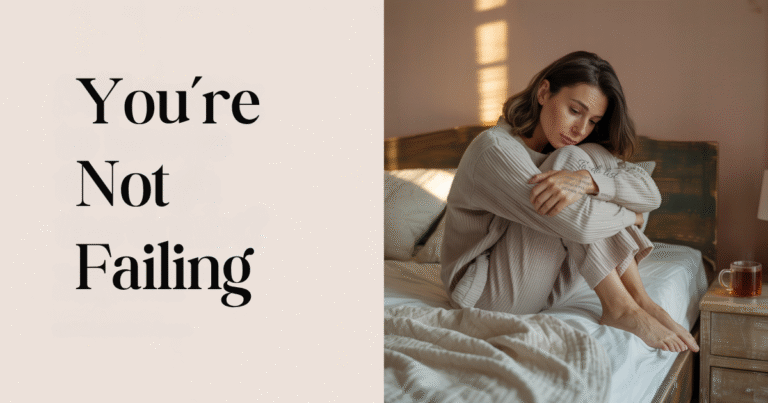 Woman sitting on bed in cozy clothes, looking thoughtful with text reading “You’re not failing,” capturing mindset reset for overwhelmed moms.