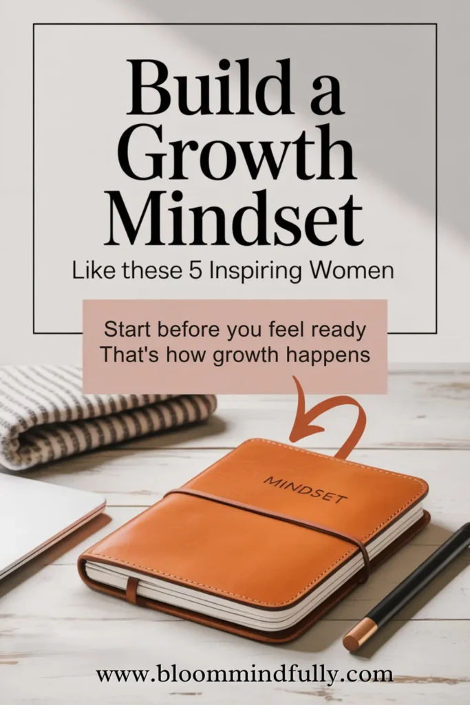 Flat lay of a leather mindset journal, striped blanket, and cozy desk scene with bold text: “Build a Growth Mindset Like These 5 Inspiring Women.” A soft, feminine productivity aesthetic.